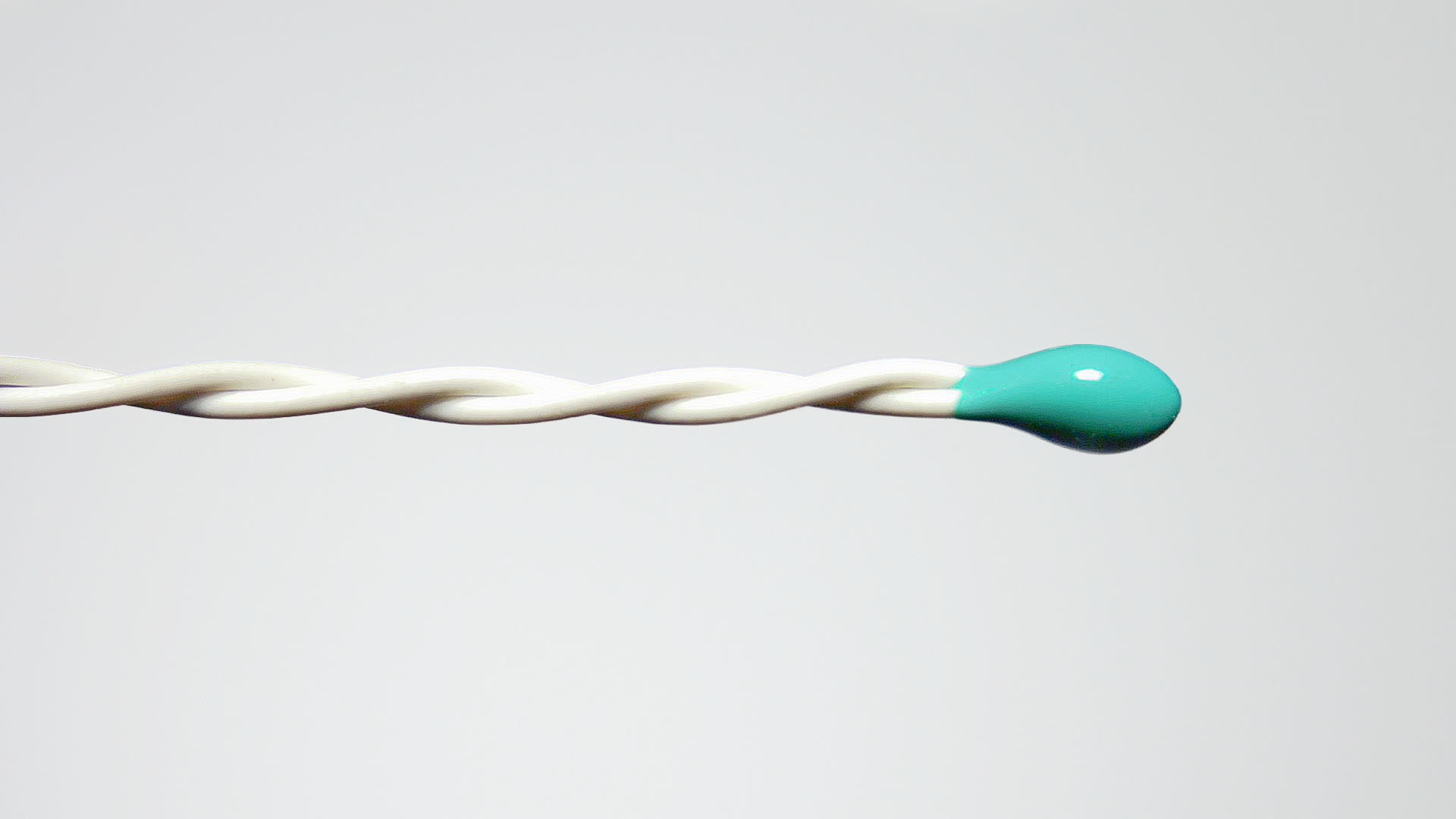 Epoxy-coated thermistor with white twisted leads